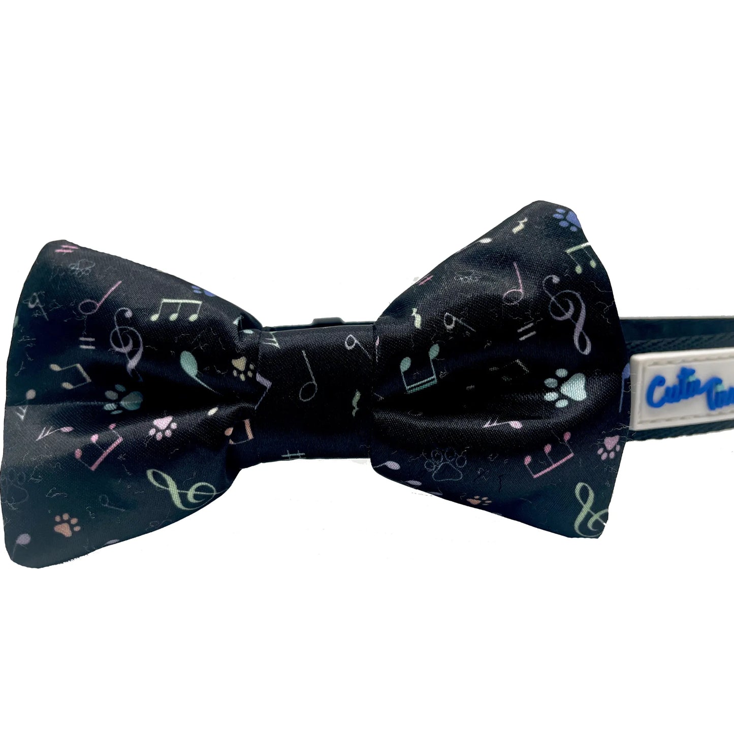 Copy the exact, literal content of Cutie Ties Floral Dog Bow Tie 2" x 4" into this field without changes.